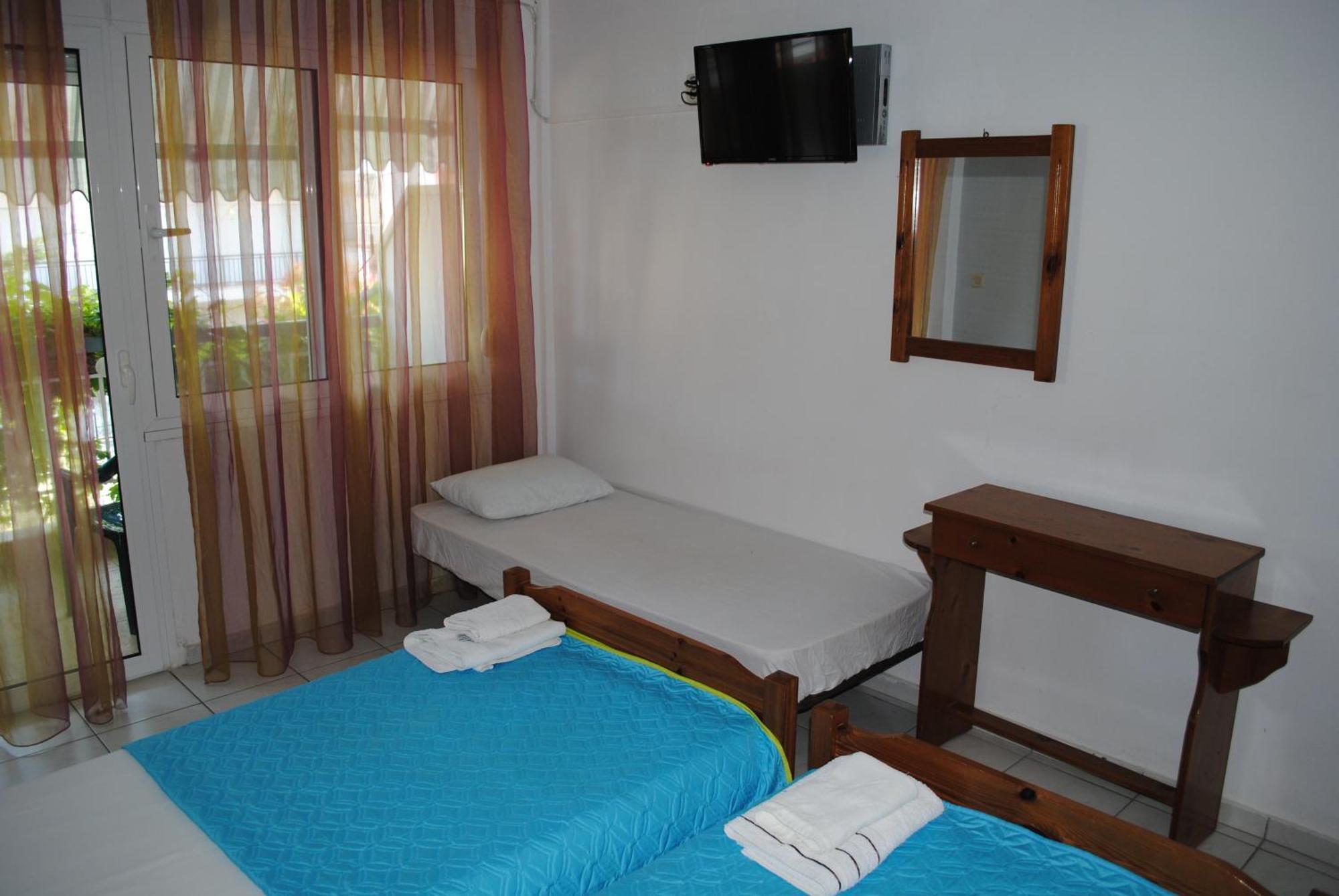 Artemis Apartments Paralia Dionisiou Habitación foto